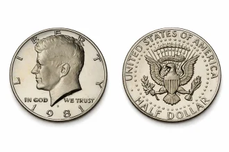 The obverse and reverse of a 1981 Kennedy half dollar.
